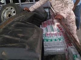 Haïti - RD : Saisie de 2,470 paquets de cigarettes de contrebande en provenance d'Haïti