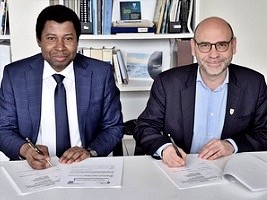 Signing of a scientific cooperation and mobility agreement between UEH and QTR