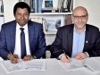 Signing of a scientific cooperation and mobility agreement between UEH and QTR